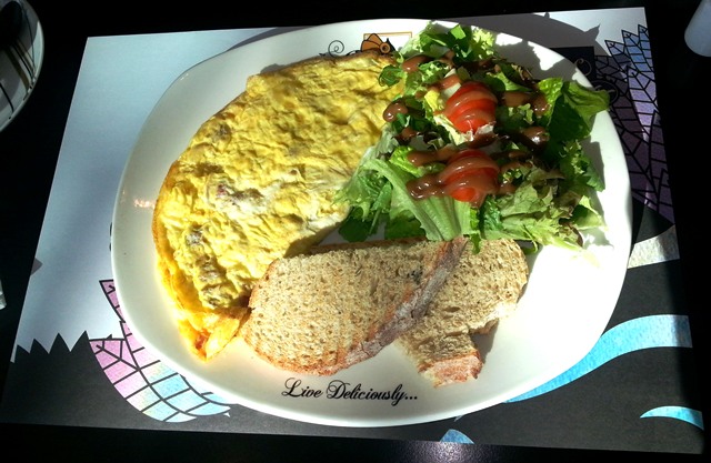 a simple egg with salad breakfast.